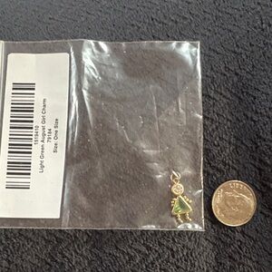 14kt Gold and Peridot Green Girl Charm for August birthday